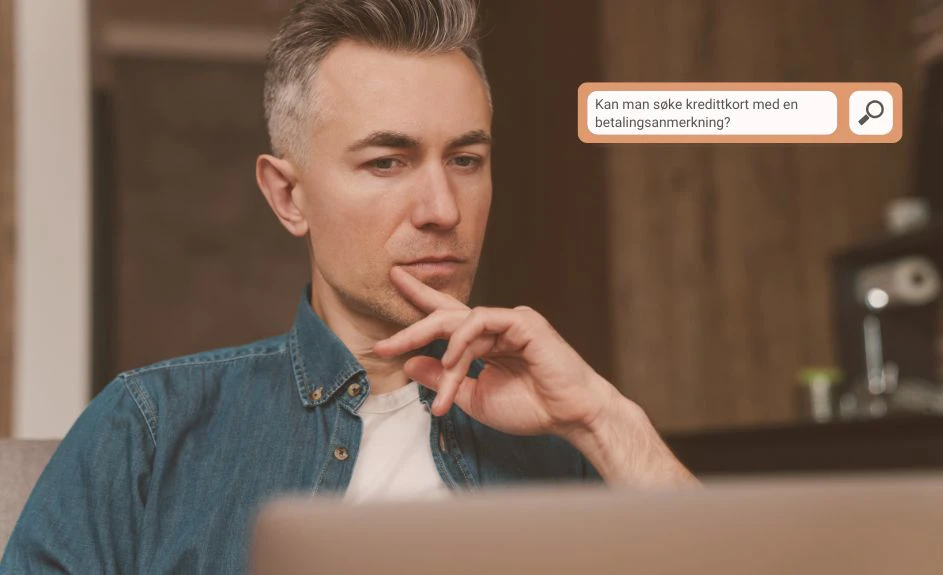 mann som tenker + tekstboks med "kan man søke kredittkort med betalingsanmerkning?"